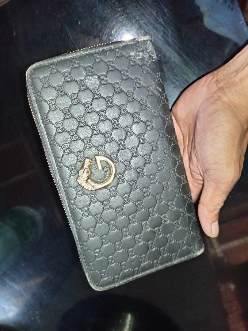 Gucci long wallet (Category: Luxury Bags & Wallets) located in Malaybalay. Submitted by cjsv0228 (Listing ID 1469482642, Image 1). Description: Gucci long wallet horse head logo 5way maraming malalagyan Issue minimal herline di halata kayu Na bahala magpa kintab Details on each Pic..