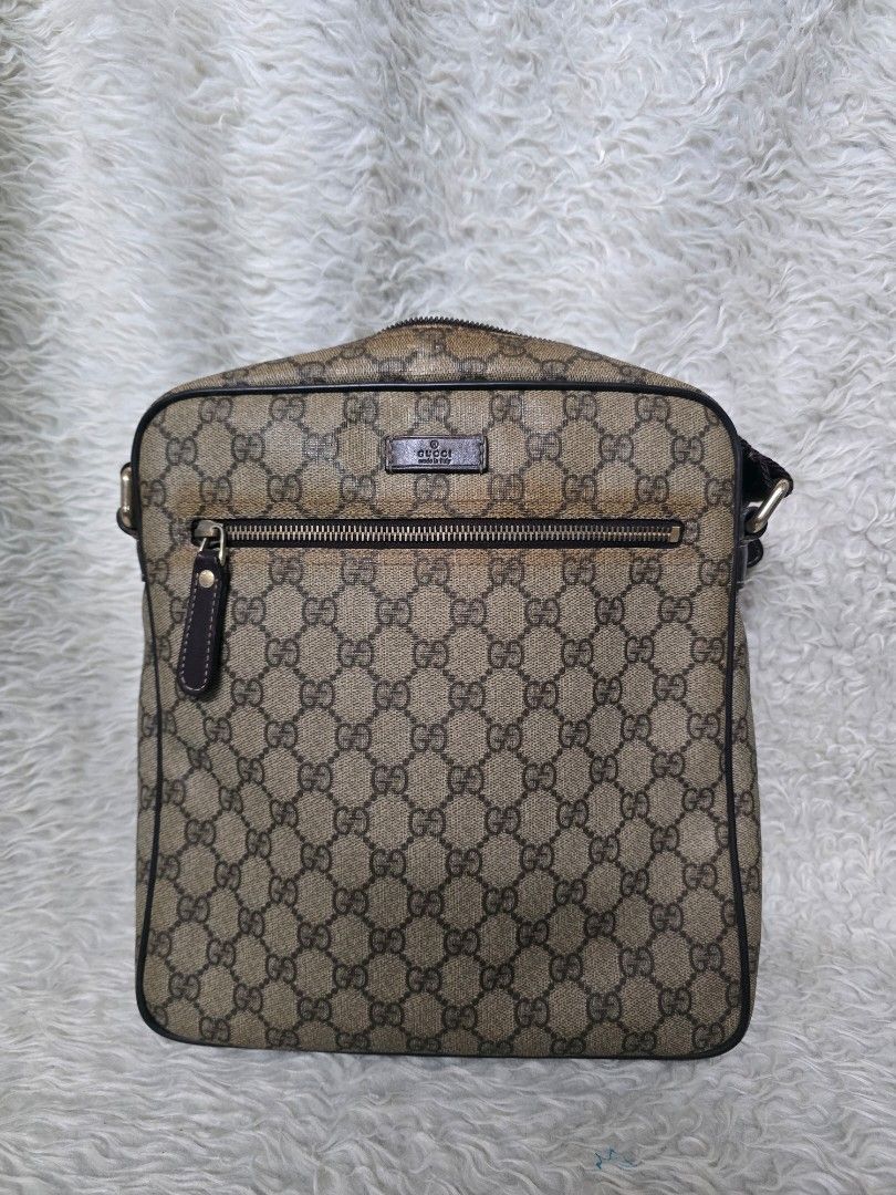 💯% AUTHENTIC Gucci Monogram Messenger Bag (Category: Luxury Bags & Wallets) located in Marikina City. Submitted by dust.end.bags (Listing ID 1469567375, Image 1). Description: - Authentic Gucci monogram messenger bag with brown leather trim - Classic canvas pattern with a structured square silhouette - Front vertical zipper pocket and small branded leather tag - Adjustable strap connected at top corners for comfortable wear - Versatile neutral b
