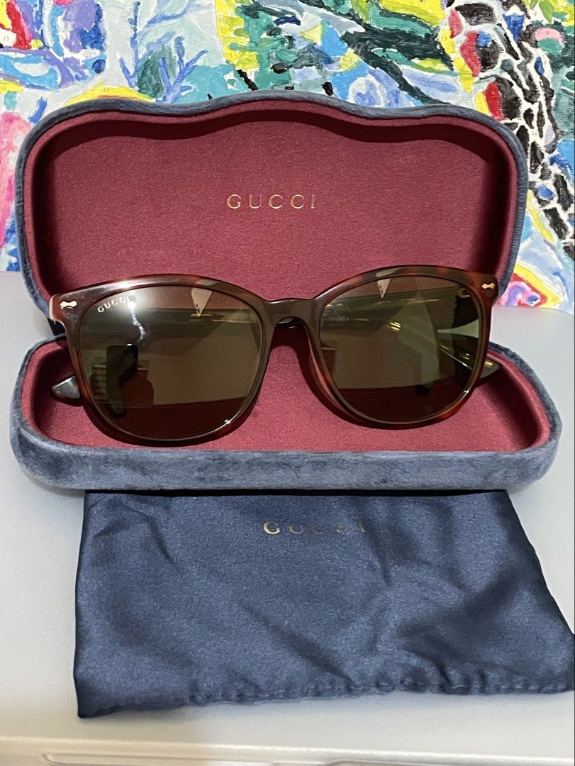 Gucci Oversized Tortoise Shell Acetate Sunglasses (GG0196SK) (Category: Luxury Accessories) located in Cavite. Submitted by HelloAnn_Closet (Listing ID 1463089839, Image 1). Description: Authentic Gucci Oversized Tortoise Shell Acetate Sunglasses (GG0196SK) Selling this stunning, classic pair of Gucci sunglasses. They feature a beautiful, rich tortoise shell acetate frame with warm-tinted gradient lenses and subtle, elegant gold-tone hardware det