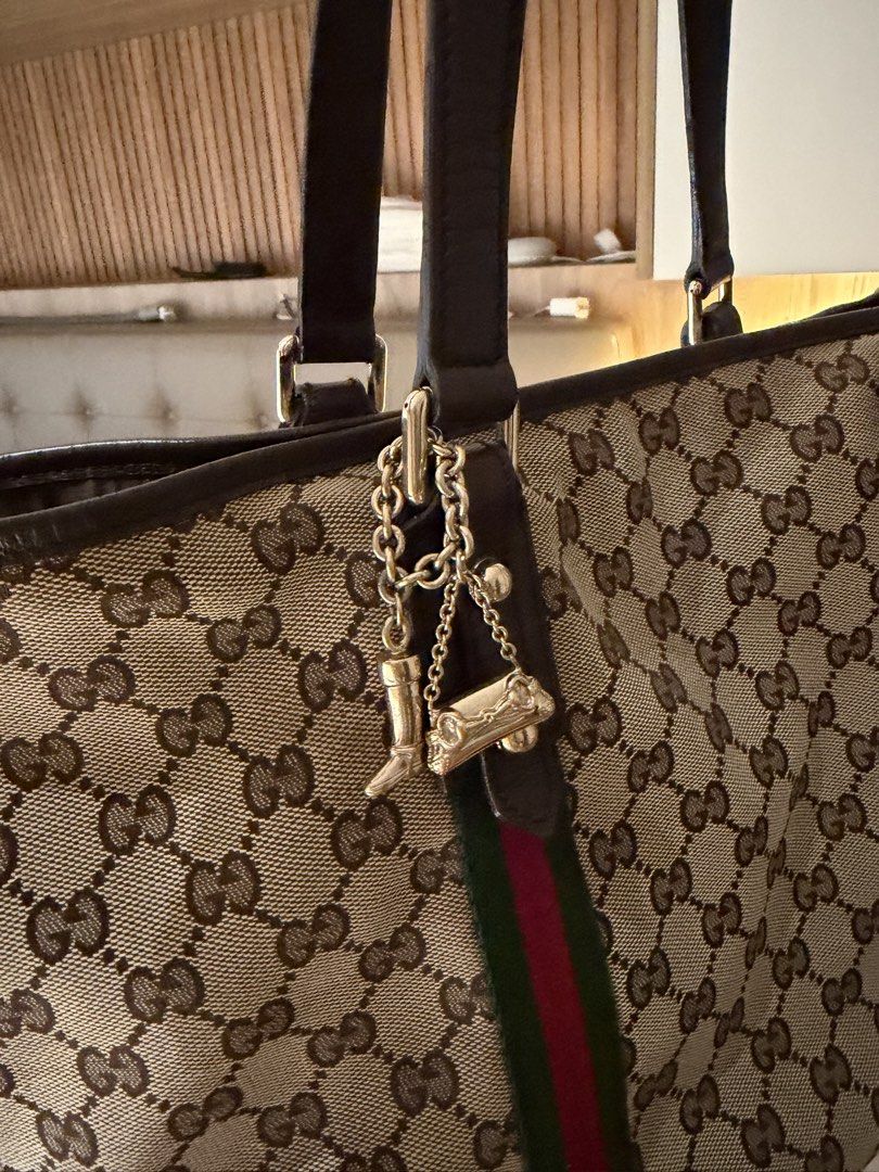 Gucci Tote- with nag charm (Category: Tote Bags) located in Makati City. Submitted by lambogirl (Listing ID 1469533842, Image 3). Description: ✔️excellent condition ✔️with dust bag and entrupy ✔️free shipping or pick up (Makati).