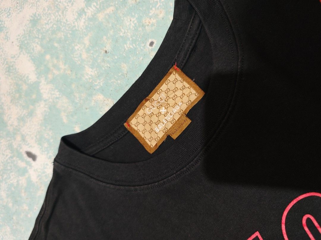 Gucci x Balenciaga (Category: Shirts) located in Calauag. Submitted by cou1_h (Listing ID 1469446788, Image 2). Description: 10/10 color rate Issue minimal craks.