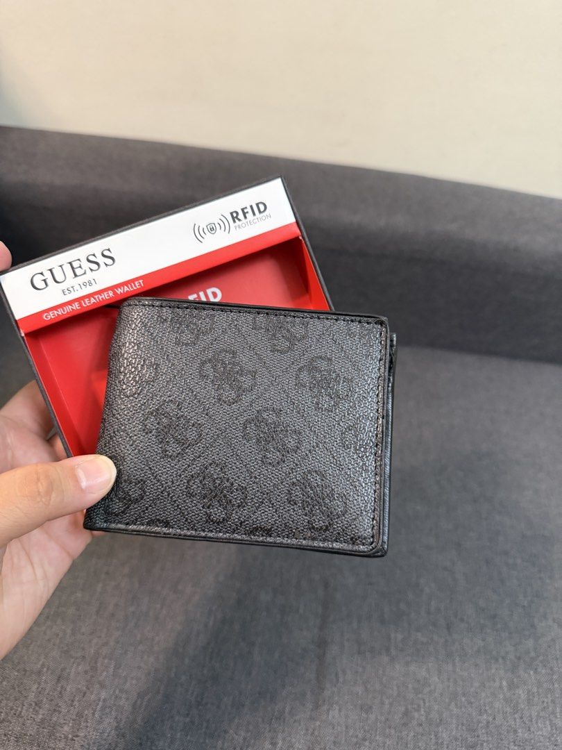 Guess Genuine Leather RFID Protection Wallet (Category: Wallets & Card Holders) located in Quezon City. Submitted by pam07pam (Listing ID 1469481764, Image 1). Description: - 100% Authentic Guess bifold wallet in classic black monogram - Crafted from premium genuine leather for durability - Built-in RFID protection keeps your cards safe from digital theft - Features multiple card slots, spacious cash compartments, and a convenient flip-out ID/car
