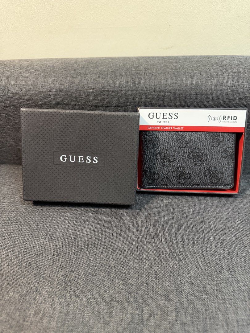 Guess Genuine Leather RFID Protection Wallet (Category: Wallets & Card Holders) located in Quezon City. Submitted by pam07pam (Listing ID 1469481764, Image 2). Description: - 100% Authentic Guess bifold wallet in classic black monogram - Crafted from premium genuine leather for durability - Built-in RFID protection keeps your cards safe from digital theft - Features multiple card slots, spacious cash compartments, and a convenient flip-out ID/car