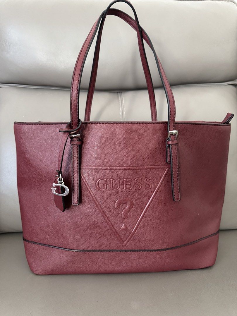 Guess Large Tote Bag Original (Category: Tote Bags) located in Makati City. Submitted by shoppinghaven.ph (Listing ID 1469452682, Image 1). Description: Guess Large Tote Bag 💯 Original from US Color: Wine Material: Faux Leather with Saffiano Finish Dimension: 16x 5.5x 11 inches Accepts layaway with 0% interest 📍Makati 🚐 LBC/ J&T/ Lalamove DP as low as 10% Remaining balance just divide into the number of months to pay. Sample for 6 mos layaway: