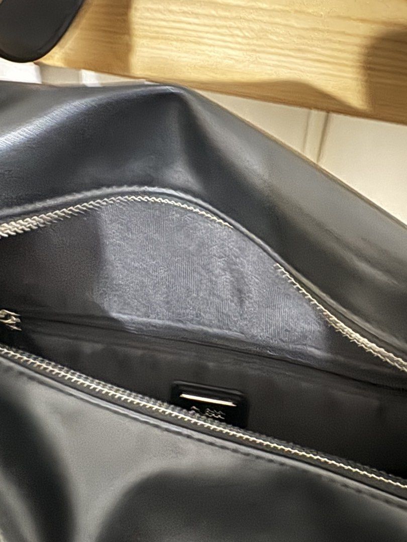 Guess Los Angeles Black Duffle Bag (Category: Shoulder Bags) located in Paranaque City. Submitted by shopdecalidad (Listing ID 1469438441, Image 3). Description: - Authentic Guess Los Angeles duffel bag in sleek black faux leather - Bold white horizontal stripes with signature branded lettering on the front - Secure top zipper closure with polished silver-tone hardware - Sturdy dual carry handles plus a matching adjustable logo shoulder strap - C