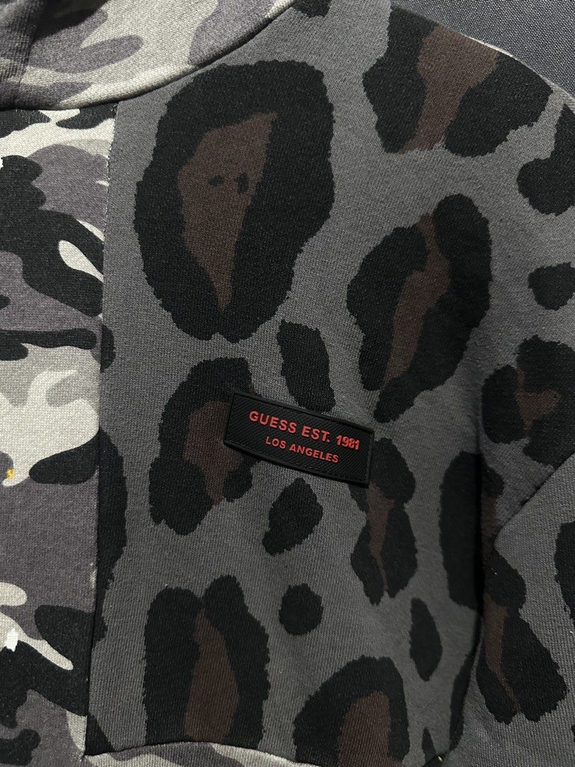Guess Los Angeles Camo & Leopard Patchwork Hoodie (Category: Hoodies) located in Buenavista. Submitted by themodernrack (Listing ID 1469429839, Image 2). Description: NOTE: Details on photos provided, kindly check thank you! Condition: Excellent condition Measurements & Sizing: Size: Medium (M) Width (Pit to Pit): 21” Length: 28”.