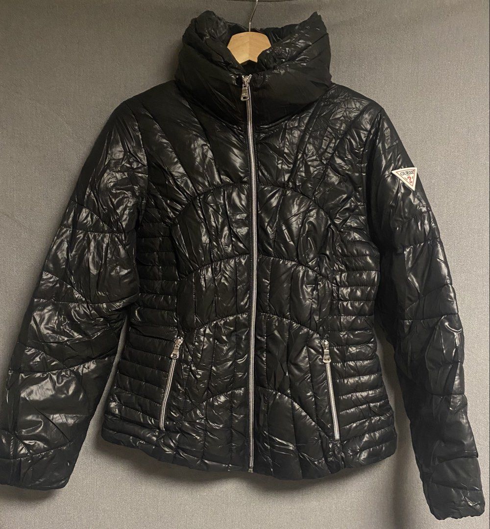 Guess Puffer Jacket (Category: Coats, Jackets and Outerwear) located in Cabuyao City. Submitted by ukaythriftshirt (Listing ID 1469419751, Image 1). Description: Guess Puffer Jacket Excellent Condition Medium Dimes 18-24 Color rate 9/10 No issue - 1000.