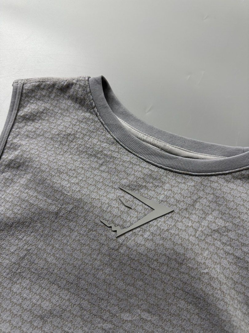 Gymshark (Category: Tshirts & Polo Shirts ) located in Pila. Submitted by villanueva80826 (Listing ID 1469533562, Image 3). Description: Gymshark training tank top Size:medium •Width:16.5 stretch •Length:27 •Condition:9/10 •Color rate:9/10 Mine:780 +Shipping fee Issue:cut tags Still in good condition Still wearable .