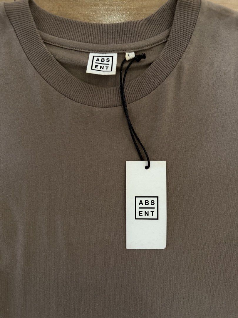 Hallensteins Beige Oversized Box Fit Shirt (Category: Tshirts & Polo Shirts ) located in Manila. Submitted by epicmountain_93c71a (Listing ID 1469435286, Image 3). Description: Brand: Hallensteins/Absent Color: Beige Size: Large Fit: Relaxed box fit with dropped shoulders Condition: Brand new with original retail tags Details: Thick ribbed crew neck collar Retail Price: $29.99 (brought it in New Zealand) Style: Great casual basic piece for everyd