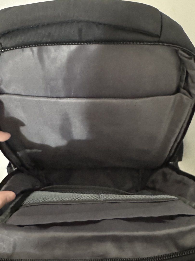Halo Black Backpack Laptop Bag (Category: Backpacks) located in Paranaque City. Submitted by shopdecalidad (Listing ID 1469438756, Image 2). Description: - Color: Classic Black - Exterior: Convenient front zip pockets - Interior: Main compartment with inner slip pockets, mesh pouch, and key strap hook - Comfort: Breathable mesh padding on back panel and shoulder straps - Perfect for daily use, school, or work.