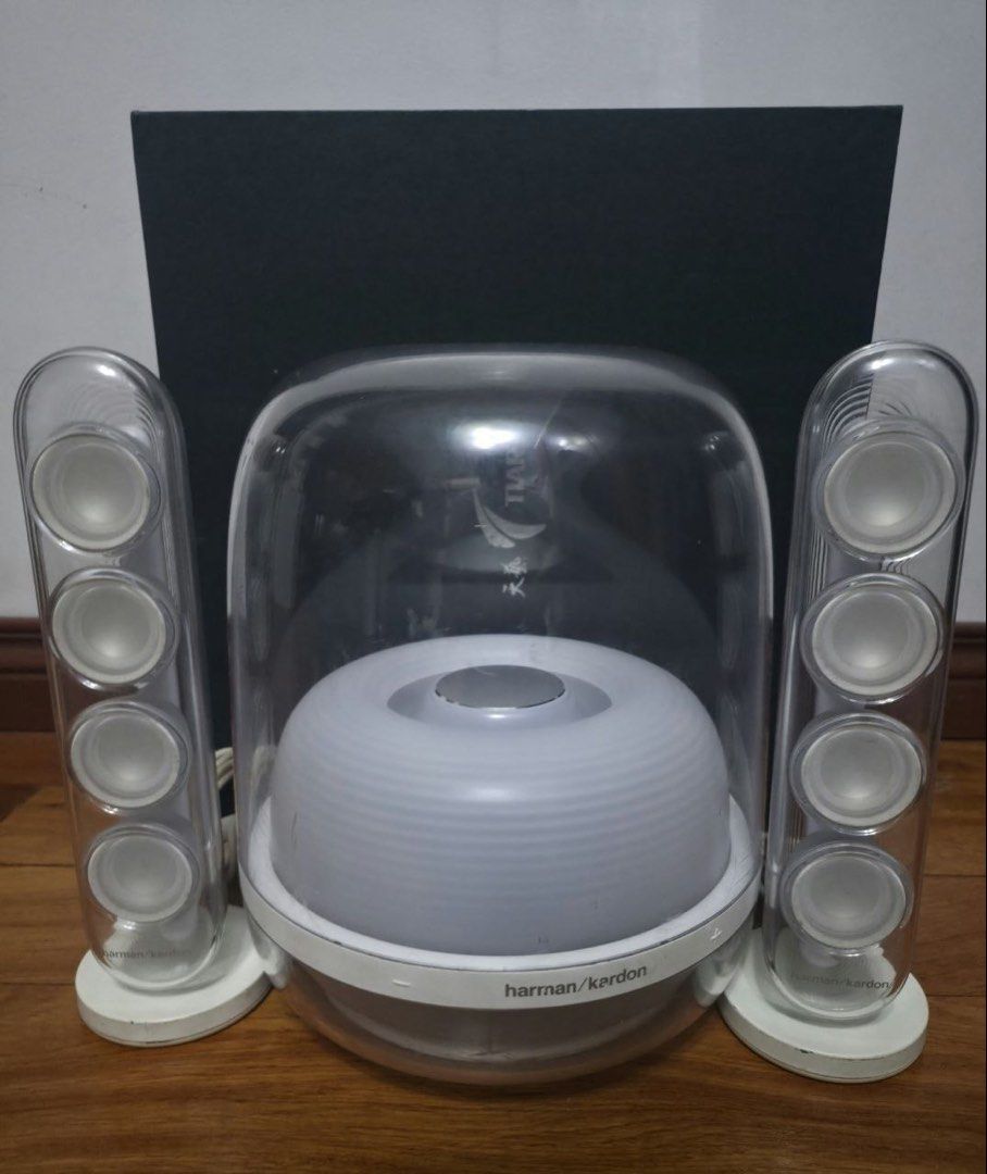 Harman Kardon SoundSticks 4 Speaker System (Category: Soundbars, Speakers & Amplifiers) located in Manila. Submitted by moonlightparis77 (Listing ID 1469538442, Image 1). Description: - Authentic Harman Kardon SoundSticks 4 wireless speaker system - Tested and 100% working properly with great sound quality - Iconic transparent dome subwoofer and two satellite speakers with clear acrylic casing - Bluetooth enabled for easy wireless streaming - Inc