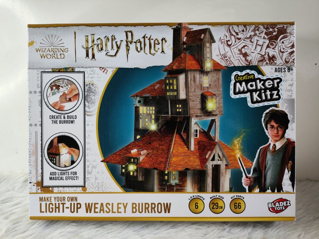 Harry Potter Creative Maker Kitz Light-Up Weasley Burrow (Category: Designer & Blind Box Toys) located in Cavite. Submitted by tinetaclesss (Listing ID 1469496902, Image 1). Description: - Official Harry Potter Weasley Burrow DIY model kit - Includes 66 kit parts for a fun and engaging build - Features 6 LED lights for a magical glowing effect - Stands 29cm tall when finished - Recommended for fans aged 8 and up - Brand new, factory taped, and un