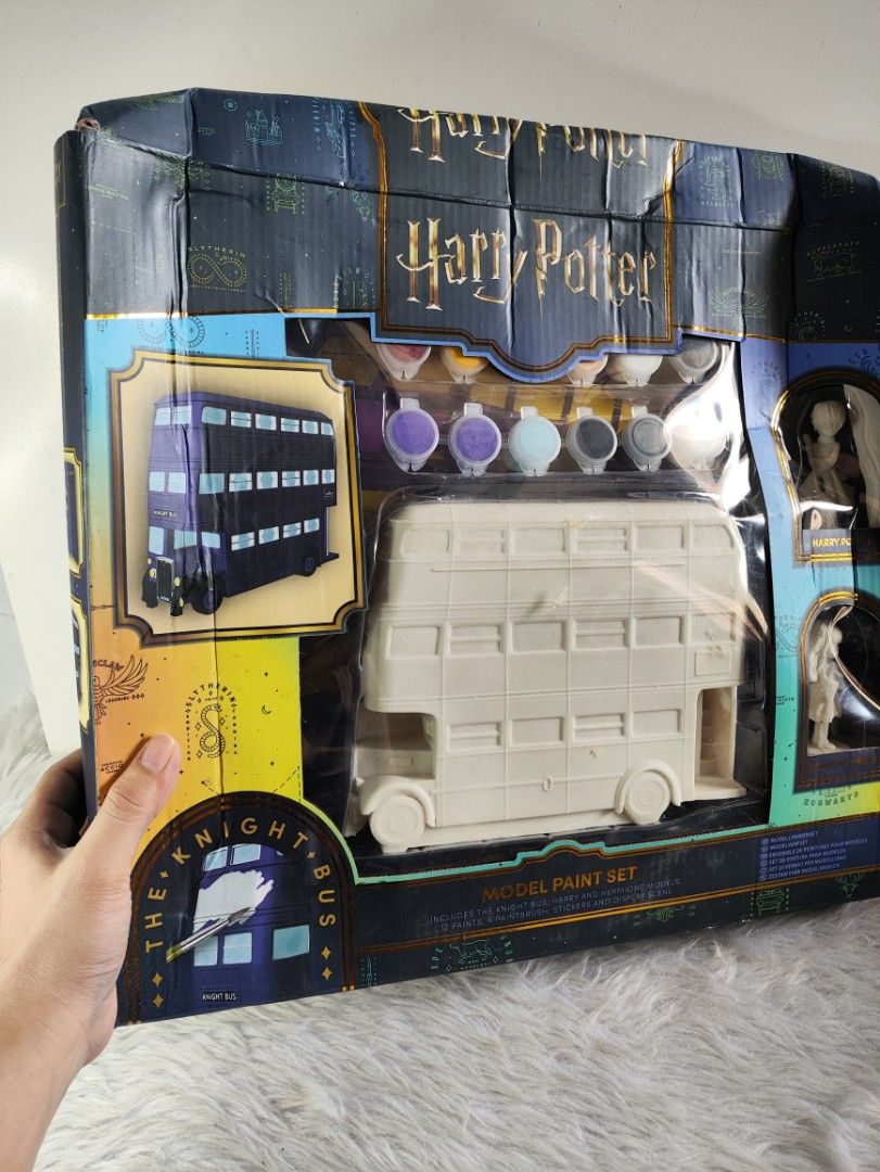 Harry Potter The Knight Bus Model Paint Set (Category: Gundam & Model Kits) located in Cavite. Submitted by tinetaclesss (Listing ID 1469549309, Image 2). Description: - Brand new and unopened Harry Potter model paint set in original packaging - Includes 1 Knight Bus model - Includes Harry Potter and Hermione Granger figures - Comes complete with 12 paints and 1 paintbrush - Includes decorative stickers and a display scene - Perfect gift for fans