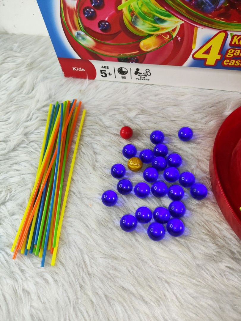 Hasbro KerPlunk Game with Box and Pieces (Category: Board Games & Puzzles) located in Cavite. Submitted by tinetaclesss (Listing ID 1469508664, Image 2). Description: - Classic KerPlunk action game by Hasbro - Includes green and red plastic tower, base, colorful sticks, and multiple blue marbles - Comes with original box (shows minor wear) - Perfect for family game nights, gatherings, and kids' parties - Complete set, clean, and 100% ready to pla