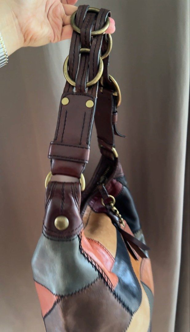 Limited Edition Coach Bleecker Leather Patchwork Duffle (Style 11465) (Category: Luxury Bags & Wallets) located in San Francisco. Submitted by wisetimepieces (Listing ID 1469443255, Image 3). Description: 25k or best offer!!! In transit!!! Sourced from Korea. Open for Layaway. Coach Bleecker Leather Patchwork Duffle (Style 11465), a limited-edition hobo bag released in 2007. Condition: Has creed and hangtag Leather handle is dry and has two crack