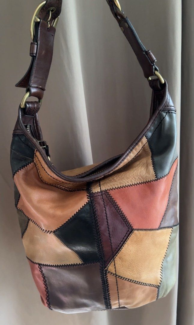 Limited Edition Coach Bleecker Leather Patchwork Duffle (Style 11465) (Category: Luxury Bags & Wallets) located in San Francisco. Submitted by wisetimepieces (Listing ID 1469443255, Image 1). Description: 25k or best offer!!! In transit!!! Sourced from Korea. Open for Layaway. Coach Bleecker Leather Patchwork Duffle (Style 11465), a limited-edition hobo bag released in 2007. Condition: Has creed and hangtag Leather handle is dry and has two crack