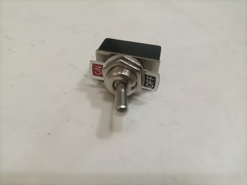 Heavy duty toggle switch with ON/OFF plate (Category: Everything Else Others) located in Quezon City. Submitted by susmaryosep1 (Listing ID 1469484769, Image 1). Description: - Classic toggle switch with a sleek silver lever and durable black housing - Includes metal ON/OFF label plate secured by the threaded mounting bushing - Convenient rear terminal pins for easy wiring connections - Ideal for various DIY electronics, automotive, and home impr