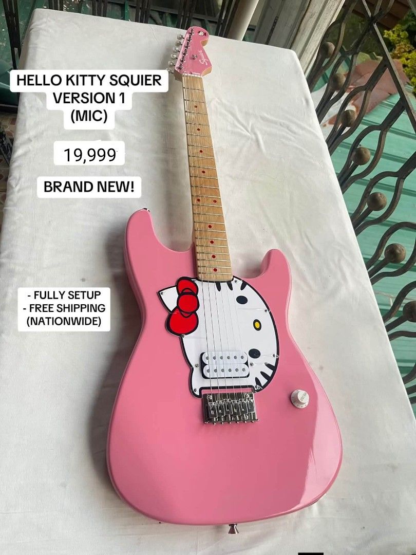 Hello Kitty Squier Version 1 Electric Guitar (Category: Musical Instruments) located in General Santos City (Dadiangas). Submitted by jay_roa (Listing ID 1469516322, Image 1). Description: - Model: Kitty Squier Electric Guitar (Version 1) - Color: Pink body with iconic white pickguard graphic - Specs: Maple neck, single humbucker pickup, single volume knob - Condition: Fully setup and ready to play right out of the box - Perks: Free nationwide sh