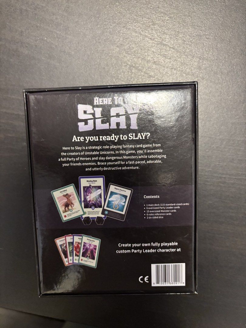 Here to Slay Strategy Card Game Unstable Unicorns (Category: Board Games & Puzzles) located in Manila. Submitted by mganovelo64040 (Listing ID 1469484767, Image 2). Description: Here to Slay strategic fantasy card game by the creators of Unstable Unicorns. Complete set including cards, two dice, and rule reference cards. Box opened to check contents only, never played..