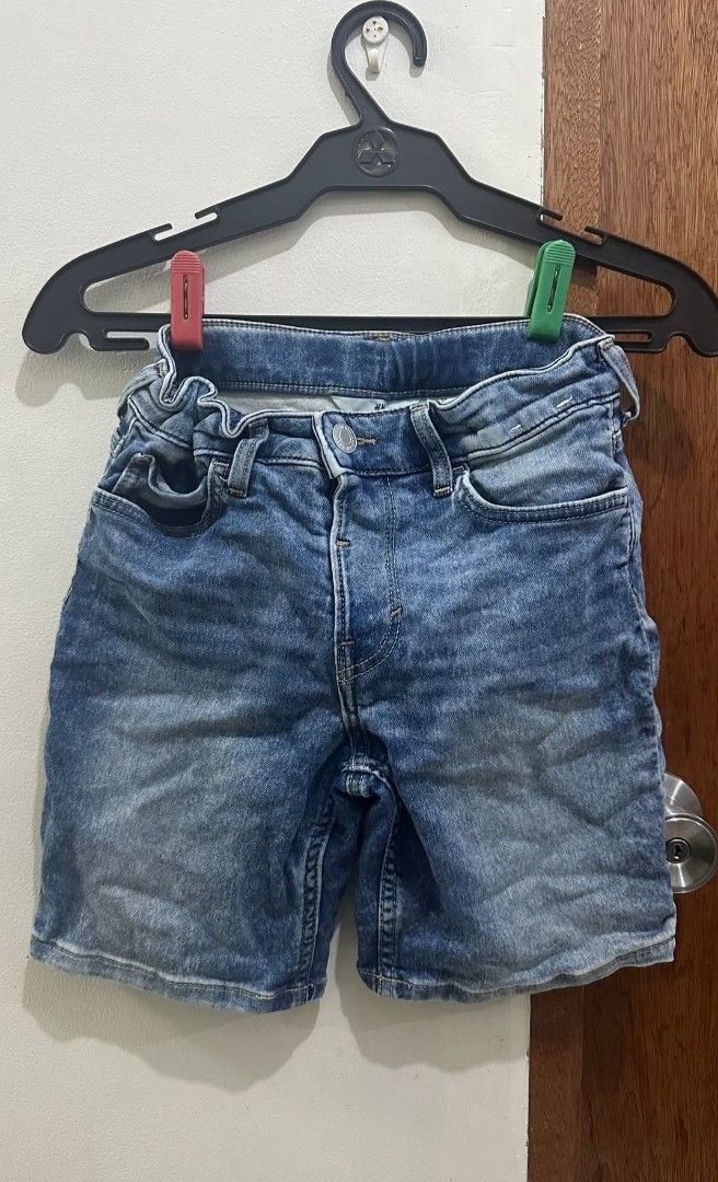 H&M Denim Shorts Boys (Category: Shorts) located in Manila. Submitted by livewater-0f48 (Listing ID 1469518927, Image 1). Description: - Brand: H&M - Item: Blue denim shorts - Closure: Classic button and zip - Pockets: Functional front and back pockets - Details: Sturdy fabric with a trendy faded wash effect - Condition: Freshly washed and ready for a new owner - Fit: Great staple piece for warm weather - 15 inches length 12 inches waistline.
