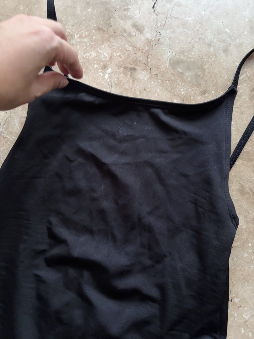H&M Open-Back One-Piece Swimsuit: Black (Category: Bikinis & Swimsuits) located in Quezon City. Submitted by tidyup.lara (Listing ID 1469569825, Image 3). Description: EUR/US XS (CN 160/80A) Bust 23” Waist 23” Length 25” Condition 9/10: good as new but with washable stain.