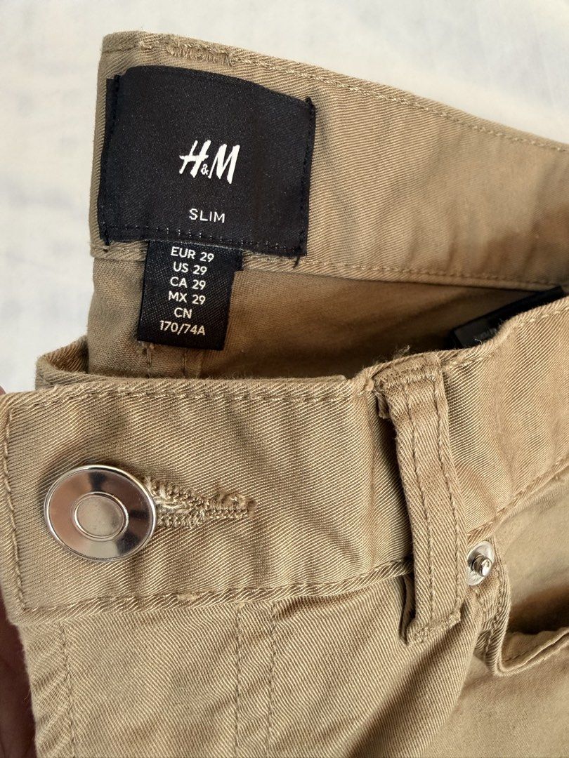 H&M Slim Fit Pants (Category: Trousers) located in Makati City. Submitted by Praktikal (Listing ID 1469485797, Image 2). Description: H&M slim fit pants 5 pockets Cotton twill Size 29 Color beige solid color Used twice only.