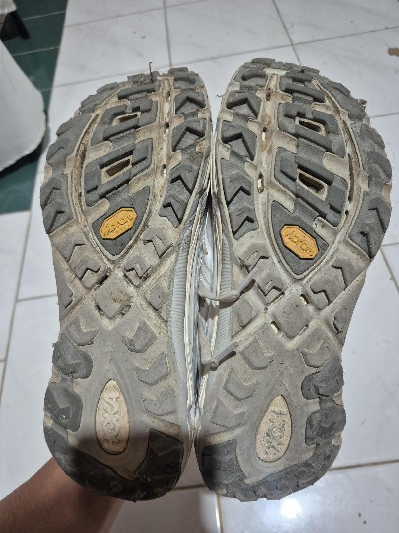 Hoka mafate speed 2 (Category: Sneakers) located in Iligan City. Submitted by _thriftaholic_ph (Listing ID 1469543687, Image 2). Description: White trail running shoes from Hoka One One. Vibram rubber outsoles with deep lugs for traction. Mesh upper panels for breathability. Standard lacing system. Normal signs of trail use on the soles and uppers. Ready for outdoor runs and hikes..
