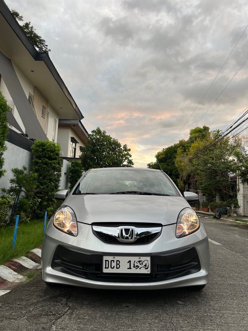Honda Brio (Category: Used Cars) located in Paranaque City. Submitted by vincebenedicto (Listing ID 1469443695, Image 2). Description: For Sale 2015 Honda Brio Gen 1 • L13 i-VTEC Engine • Manual Transmission • Original Paint • All Power • All Glass Original Honda • Thick Michelin Tires all around • Cold aircon • Everything works • Registered complete and original papers barely use it , all clean still rides and smells like a new car 370k.