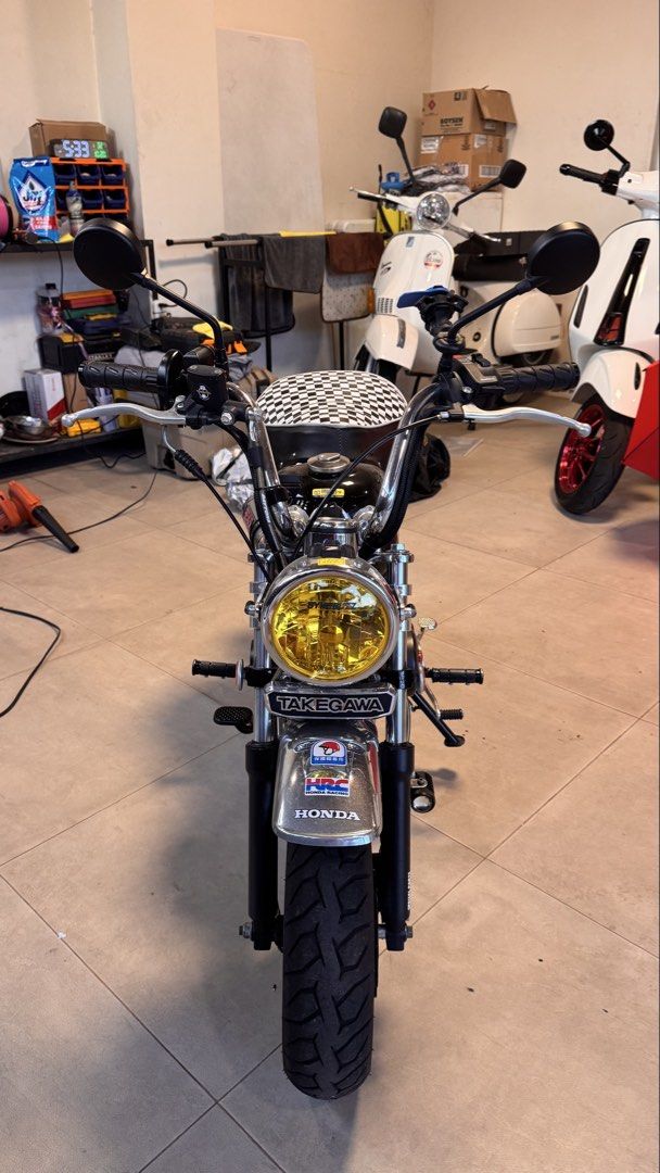 Honda Z50 Monkey Motorcycle (Category: Motorbikes for Sale) located in Binan City. Submitted by japeeamoranto (Listing ID 1469568331, Image 3). Description: Honda Z50 Monkey bike in black. Odometer reads 03467 km. Takegawa speedometer and special parts installed. Includes checkered pattern seat, side storage bag, Yoshimura exhaust, and yellow headlight tint. Upgraded front disc brakes. Chrome fenders and handlebars. Clean build, runs great..