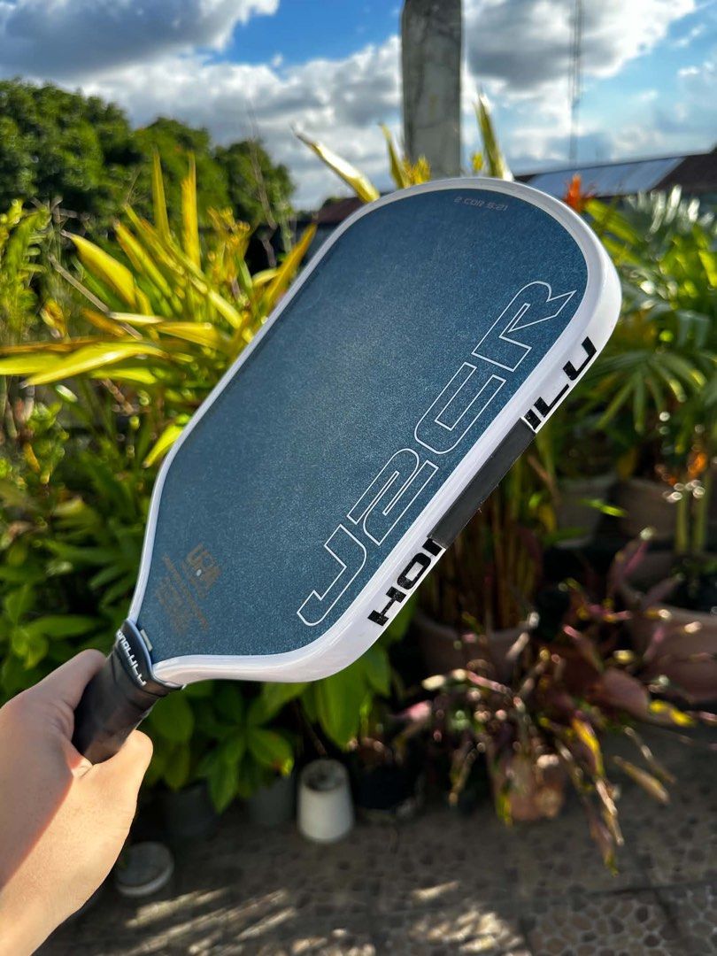Honolulu J2CR Pickleball Paddle (Category: Racket and Ball Sports) located in Quezon City. Submitted by chrgmrls (Listing ID 1469418283, Image 1). Description: J2CR Crystal Blue White SH Condition: 9.9/10 (1 week used) -PPF edge guard installed since day 1 RFS: Extra paddle Price: 10,500 Location: Fairview, Quezon City.