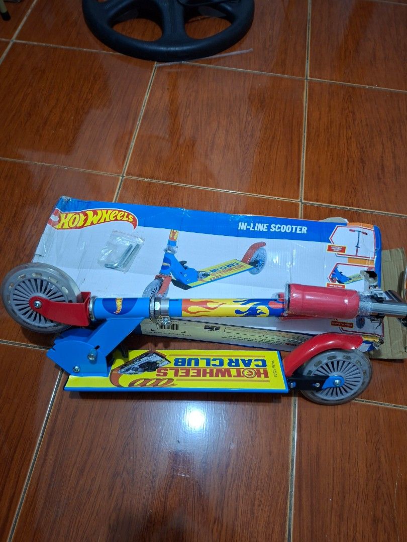 Hot Wheels In-Line Scooter. (Category: Kids Toys) located in Manila. Submitted by happywindmarlyn (Listing ID 1469437083, Image 3). Description: - Hot Wheels In-Line Scooter for kids! - Features: * Quick-Folding Desig * Adjustable Handlebars * Adjustable Handlebars *Smooth-Rolling Wheels *Rear Foot Brake - Brand new Hot Wheels scooter. The box has some dents, but the item inside is 100% good and brand new..