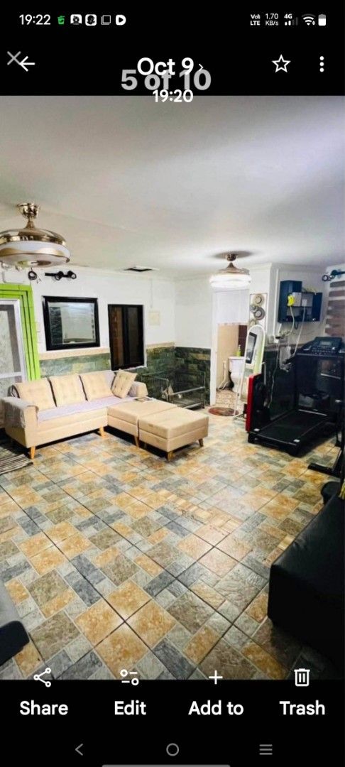 House with L-shaped sofa, treadmill, and tiled flooring (Category: Apartments & Condos) located in Manila. Submitted by puretiger.2cd3d1 (Listing ID 1469394334, Image 2). Description: PERPETUAL & LIFETIME BLPC is • Fully Awarded Units: Built by the National Housing Authority (NHA) in the late 1970s under the legacy BLISS program, these 4-story walk-up apartments were fully allocated or sold to their original beneficiaries decades ago. The NHA doe