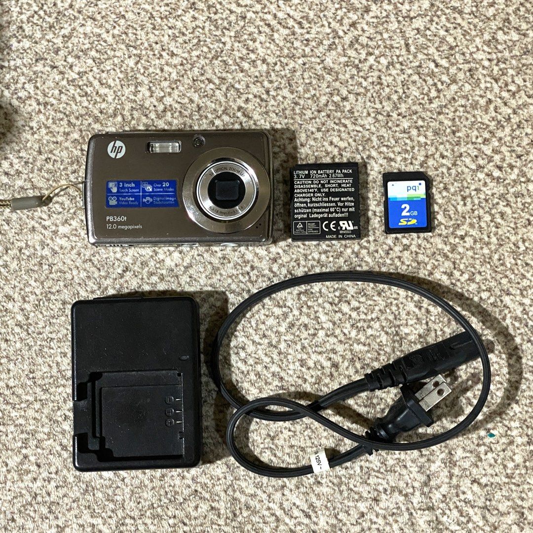 HP PB360t Digital Camera (Digicam) TOUCHSCREEN in SILVER with ACCESSORIES ! (Category: Cameras) located in Manila. Submitted by hailtothefilm (Listing ID 1469462001, Image 1). Description: 📸 HP PB360t Digital Camera (Digicam) TOUCHSCREEN in SILVER with ACCESSORIES ! for Sale 3,599! DESCRIPTION: ✅in PRISTINE body condition. ✅ crisp outputs ✅Tested, fully functioning. ✅ Fully functioning LCD, all sides ✅ 12.0 megapixel ✅ 3.0 inches screen ✅ One of