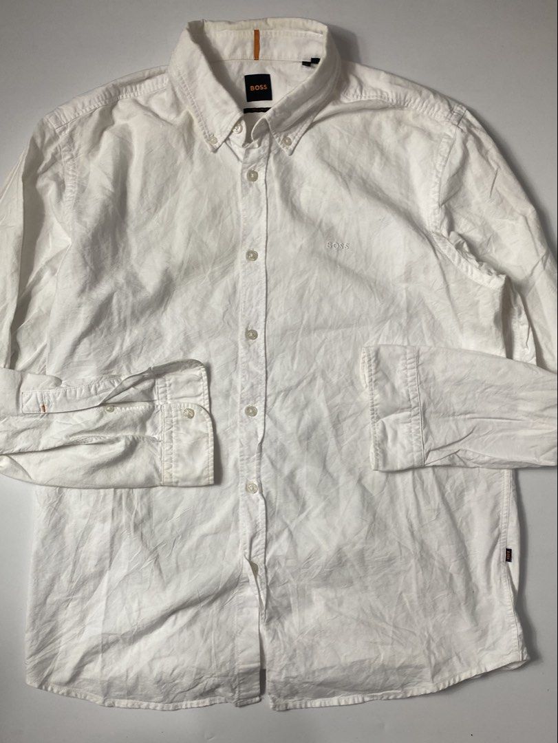 Hugo boss button down longsleeve (Category: Formal Shirts) located in Lipa City. Submitted by _thriftitcloud (Listing ID 1469403929, Image 1). Description: 24x30 Excellent.