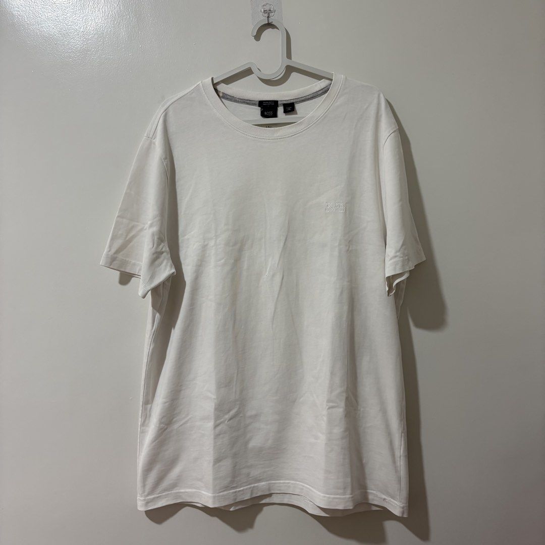 Hugo Boss Minimalist White Shirt (Category: Tshirts & Polo Shirts ) located in Bulacan. Submitted by laleesa_ (Listing ID 1469447313, Image 1). Description: Large-XL Men Issue: Pinhole (see last pic).