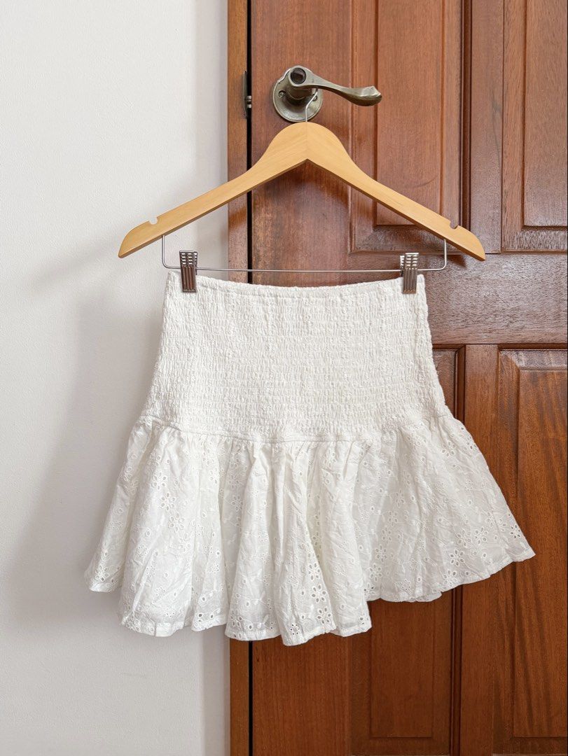 Indikah Smocked Eyelet Skirt (Category: Skirts) located in Paranaque City. Submitted by consciouscleanout (Listing ID 1469041001, Image 1). Description: New without tags. Best fits S-M (26-28”).