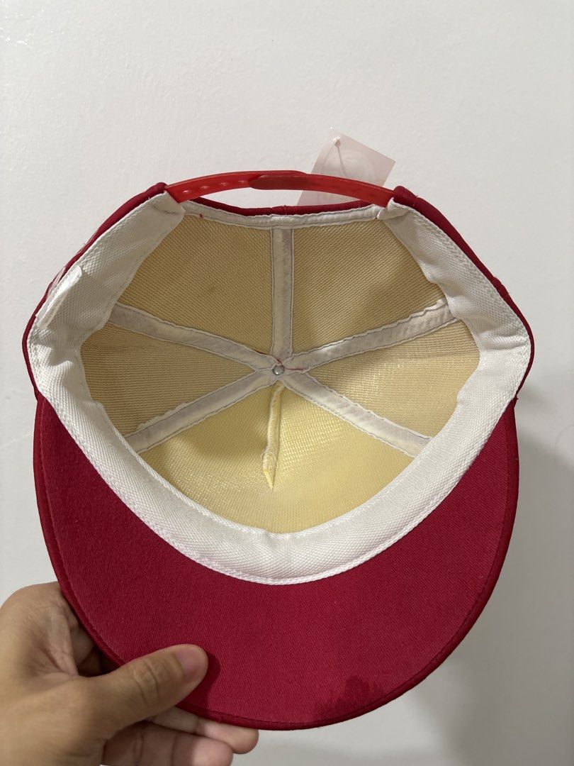 In-N-Out Burger Red White Snapback Trucker Hat (Category: Caps & Hats) located in Calbayog City. Submitted by zaxcheus_castillo1708 (Listing ID 1469509632, Image 2). Description: - Brand: In-N-Out Burger - Style: Snapback hat (red and white colorway) - Details: Raised rubberized logo on front, yellow inner mesh lining - Closure: Adjustable plastic strap at the back - Condition: Clean, brand new with tag still attached.