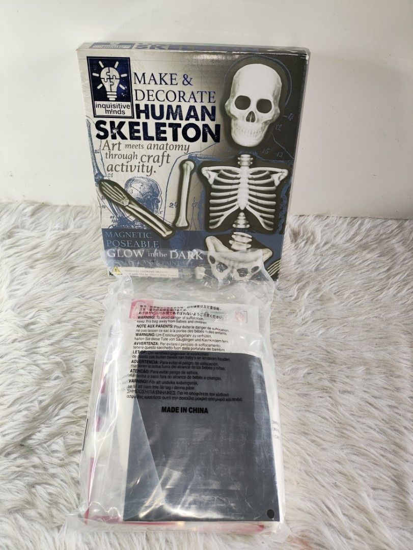 Inquisitive Minds Make and Decorate Human Skeleton Kit (Category: Educational & Learning Toys) located in Cavite. Submitted by tinetaclesss (Listing ID 1469497466, Image 1). Description: - Brand: House of Marbles - Item: Plaster Cast & Paint Skeleton Set - Features: Magnetic, poseable, and glows in the dark! - Size: Finished skeleton is approximately 340mm tall - Kit Includes: 2 moulding trays, 2 bags of plaster powder, glow and grey paints, self