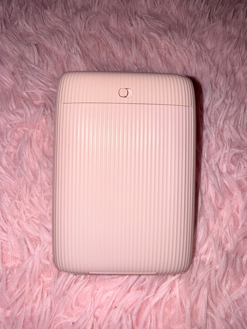 INSTAX MINI LINK 2! (Category: Other Gadgets) located in Caloocan City. Submitted by reynyyy184 (Listing ID 1469492710, Image 3). Description: ✨Fujifilm Instax Mini Link 2 with Protective Case✨ Price: ₱4,500 (Slightly negotiable) Description: Selling my pre-loved Fujifilm Instax Mini Link 2 Smartphone Printer. Perfect for printing your phone photos instantly. PACKAGE INCLUSIONS: • 1 x Instax Mini Link 2 Unit (Color: Pink) • 1 x Protective Case (w