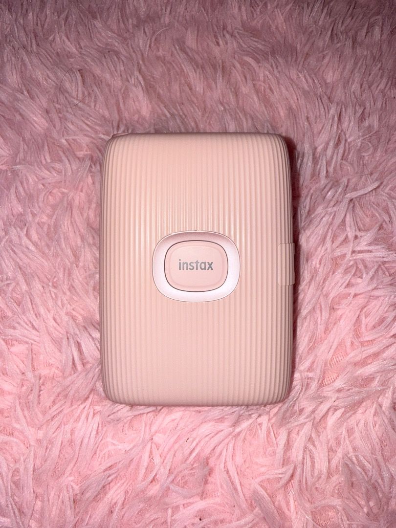 INSTAX MINI LINK 2! (Category: Other Gadgets) located in Caloocan City. Submitted by reynyyy184 (Listing ID 1469492710, Image 1). Description: ✨Fujifilm Instax Mini Link 2 with Protective Case✨ Price: ₱4,500 (Slightly negotiable) Description: Selling my pre-loved Fujifilm Instax Mini Link 2 Smartphone Printer. Perfect for printing your phone photos instantly. PACKAGE INCLUSIONS: • 1 x Instax Mini Link 2 Unit (Color: Pink) • 1 x Protective Case (w