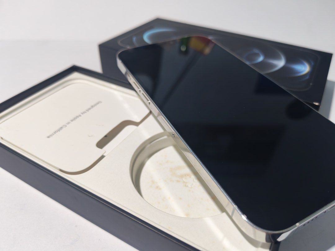 Iphone 12 Pro Max (Hong Kong Edition - Dual Sim) (Category: iPhone 12 Series) located in Talisay. Submitted by LoveHandleToys (Listing ID 1469424520, Image 2). Description: Posting it here with a slight heavy heart because I love this phone so much. I have 2 other phones that I have to let go of this one. There’s one hard-to-see scratch at the lower left of the screen. A screen protector will hide it. There are some proof-of-use at the sides that