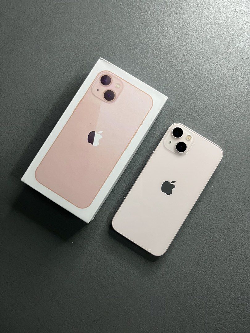 Iphone 13 Pink 128gb (Category: iPhone 13 Series) located in Tanauan. Submitted by zsacky.declutter (Listing ID 1469520303, Image 1). Description: Iphone 13 128gb Pink For Sale or Swap to lower units - Good Condition - ZP/A variant (NTC approved) - Openline (Any sim compatible) - Not refurbished - Never been repaired - Working all - 79% Battery health (Never been replaced) - Sign of usage (Scratches and paint chips) Inclusions: - Rep Box - Cord -