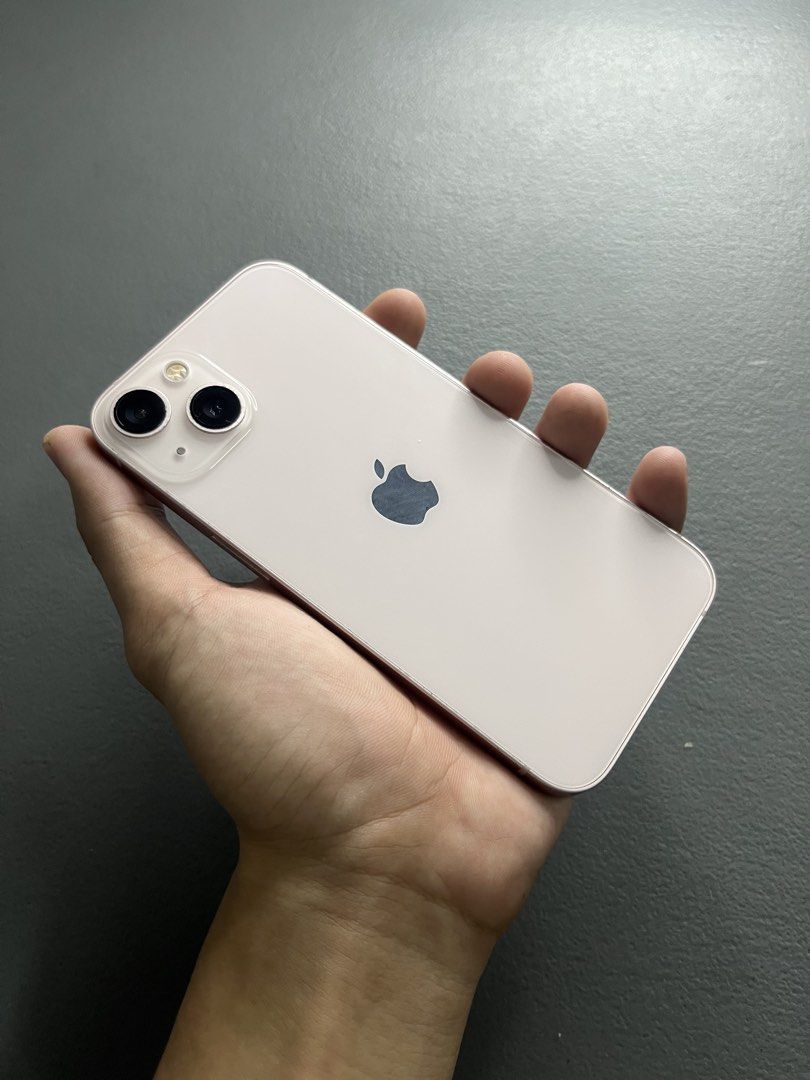 Iphone 13 Pink 128gb (Category: iPhone 13 Series) located in Tanauan. Submitted by zsacky.declutter (Listing ID 1469520303, Image 2). Description: Iphone 13 128gb Pink For Sale or Swap to lower units - Good Condition - ZP/A variant (NTC approved) - Openline (Any sim compatible) - Not refurbished - Never been repaired - Working all - 79% Battery health (Never been replaced) - Sign of usage (Scratches and paint chips) Inclusions: - Rep Box - Cord -