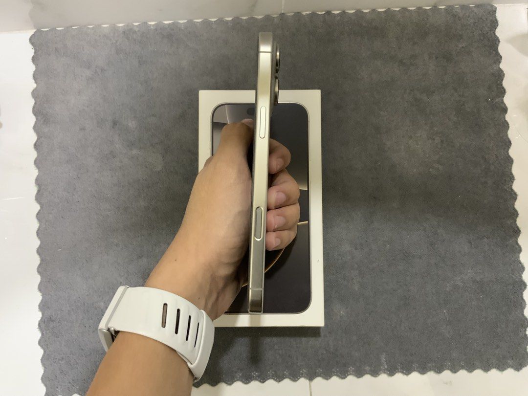 iPhone 16 Pro Max (Category: iPhone 16 Series) located in Quezon City. Submitted by 135rarecat (Listing ID 1469531036, Image 3). Description: -16 pro max -Natural titanium -256 gb -FU -87 bh -Makinis -No issue Inclusions: Original box, cases, cord QC Proj 8.