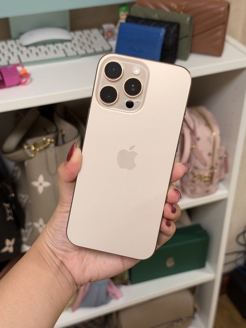 Iphone 16 Pro Max | 256GB Open Line | Desert Titanium (Category: iPhone 16 Series) located in Pasay City. Submitted by erickaolalu (Listing ID 1469499890, Image 1). Description: - Model: Apple iPhone 16 Pro Max - Storage: 256GB - Color: Desert Titanium - Battery Health: 90% - Network: Open Line (works with all local networks) - Condition: Like new, with crack tempered glass screen but smooth body - Inclusions: Original box, installed tempered gla