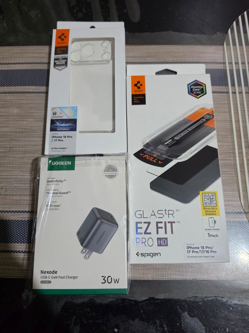 iPhone 18 Pro Glacier 256GB (Category: Cases & Sleeves) located in Manila. Submitted by tiane_12 (Listing ID 1469489880, Image 2). Description: - Model: Apple iPhone 18 Pro - Color: Glacier - Storage: 256GB - Condition: Brand new, sealed in box - Bonus Bundle: - Spigen Glas.tR EZ FIT Pro HD Screen Protector - Spigen Ultra Hybrid Case - Ugreen 30W USB-C GaN Fast Charger.