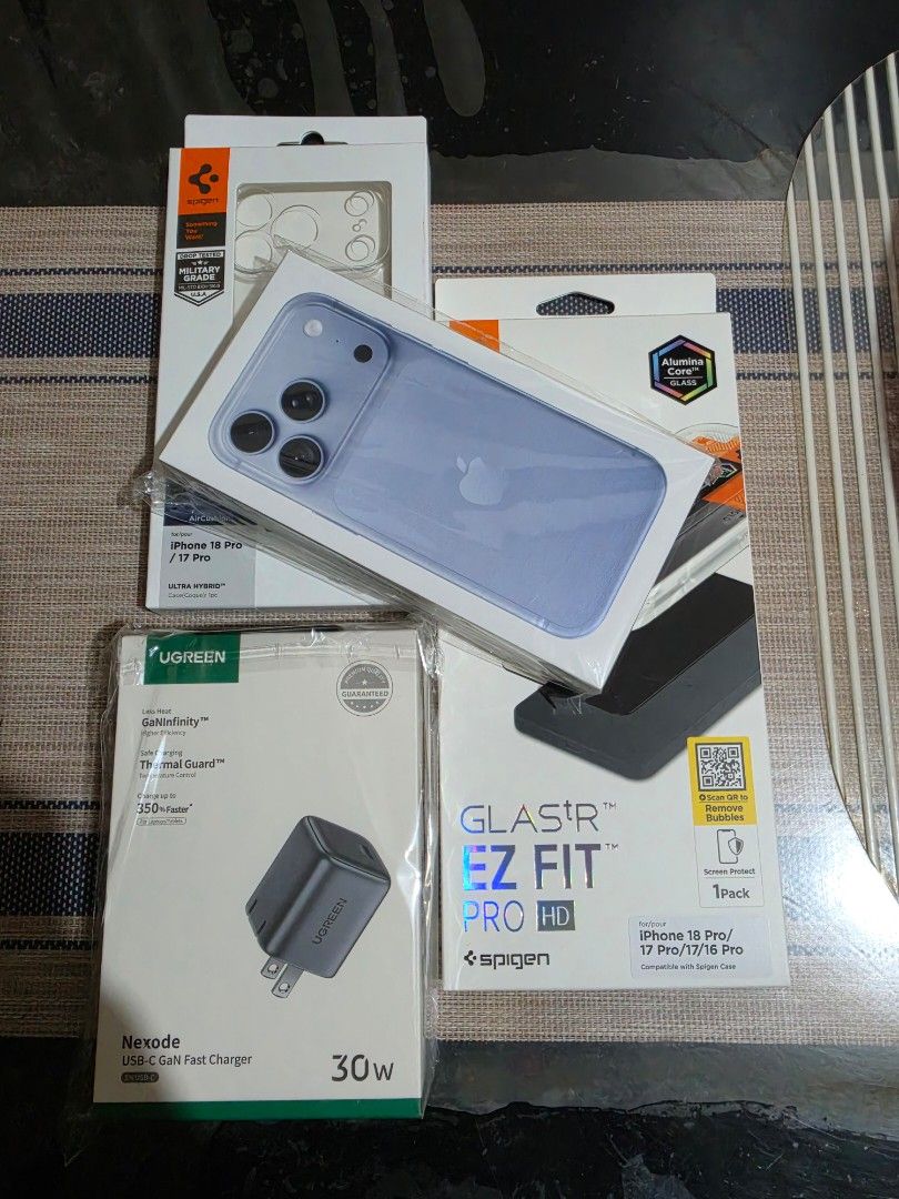 iPhone 18 Pro Glacier 256GB (Category: Cases & Sleeves) located in Manila. Submitted by tiane_12 (Listing ID 1469489880, Image 3). Description: - Model: Apple iPhone 18 Pro - Color: Glacier - Storage: 256GB - Condition: Brand new, sealed in box - Bonus Bundle: - Spigen Glas.tR EZ FIT Pro HD Screen Protector - Spigen Ultra Hybrid Case - Ugreen 30W USB-C GaN Fast Charger.