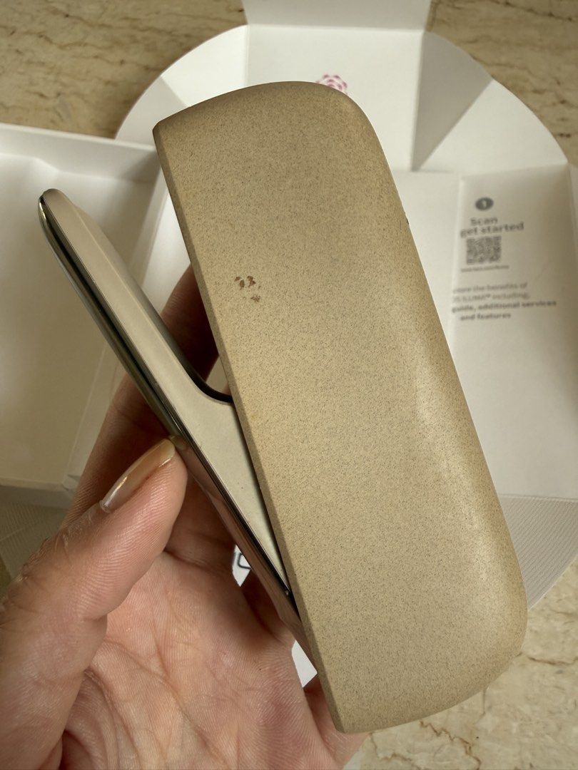 IQOS ILUMA System Pebble Beige CHARGER (Category: Health Monitors & Weighing Scales) located in Pasig City. Submitted by bitofahoarder (Listing ID 1469572188, Image 3). Description: - Authentic IQOS ILUMA (Pebble Beige) Charger - Powered by Smartcore induction technology - Condition: Cosmetic wear on exterior casing, charger 100% working. - This listing is ONLY FOR THE CHARGER. The holder no longer works, but I can include it if you want. - Packa