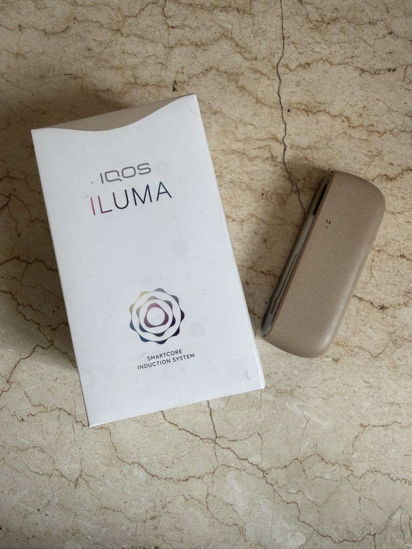 IQOS ILUMA System Pebble Beige CHARGER (Category: Health Monitors & Weighing Scales) located in Pasig City. Submitted by bitofahoarder (Listing ID 1469572188, Image 2). Description: - Authentic IQOS ILUMA (Pebble Beige) Charger - Powered by Smartcore induction technology - Condition: Cosmetic wear on exterior casing, charger 100% working. - This listing is ONLY FOR THE CHARGER. The holder no longer works, but I can include it if you want. - Packa