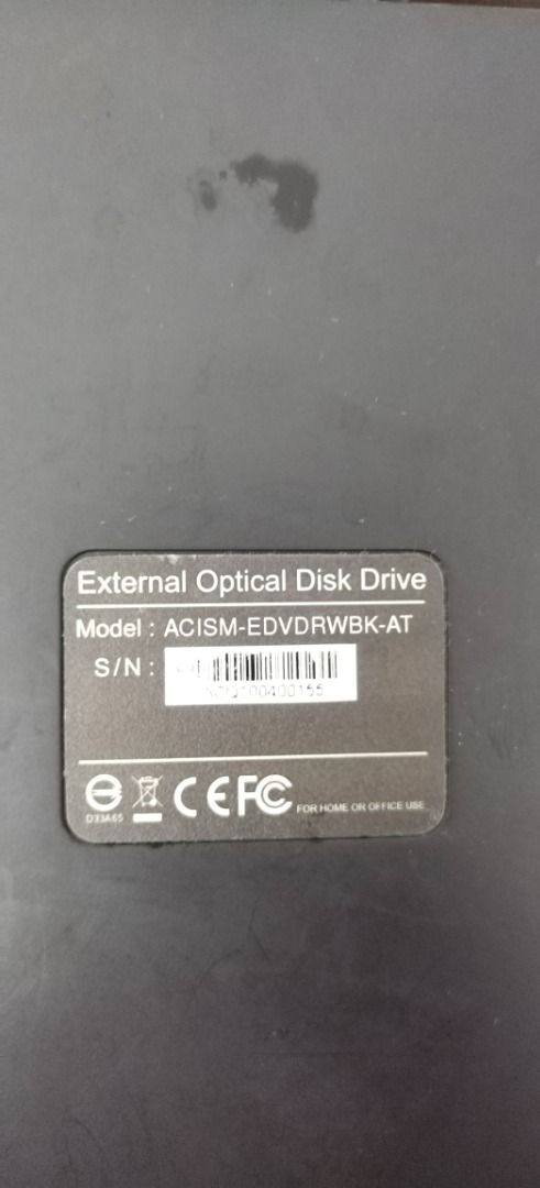 iSmart External DVDRW (Category: Hard Disks & Thumbdrives) located in Quezon City. Submitted by mdmedz (Listing ID 1469514176, Image 1). Description: Selling a working Black iSmart external optical disk drive (Model: ACISM-EDVDRWBK-AT) with attached USB cable. Supports DVD multi recording and CD rewriting. Has minor smudge marks and light wear from storage, but tested and works normally. Can write on DvDs and CDs.